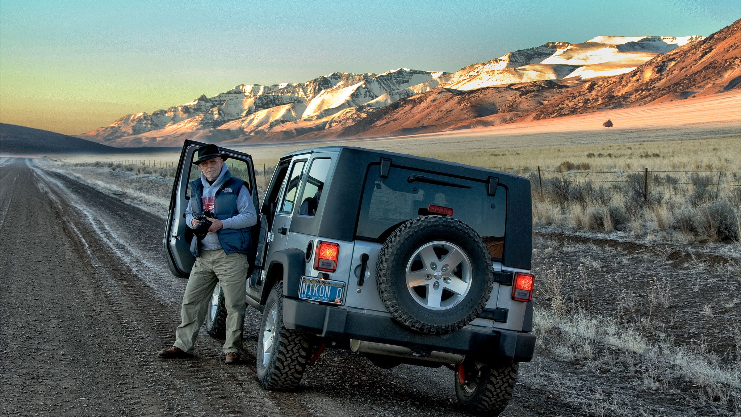 Photographer Richard Stefani beside his Jeep in the Eastern Oregon mountains. 